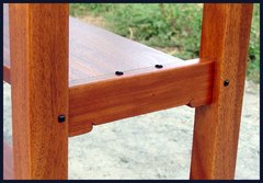 Detail of the square Ebony pegs in the legs and the cloud-lift stretcher supporting the middle shelf.